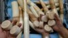 FILE - Thai customs officers show seized ivory during a news conference at the customs office in Bangkok.