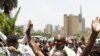 Striking public health workers participate in a demonstration as they enter the Ministry of Health headquarters in Kenya's capital Nairobi, March 9, 2012. 