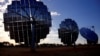 FILE - A solar panel array can be seen at the Windorah Solar Farm, which was installed by Ergon Energy, near the town of Windorah in outback Queensland, Australia, Aug. 11, 2017.