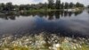 FILE - Dumped waste lies along the bank of the river Sava in Belgrade, Serbia, June 5, 2020. Only 37% of Europe's surface water bodies achieved "good" or "high" ecological status, a measure of aquatic ecosystem health, an EEA report said Oct. 15, 2024.