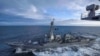 The U.S. Navy Arleigh Burke-class guided-missile destroyer USS Kidd transits alongside the aircraft carrier USS Theodore Roosevelt while participating in Exercise Northern Edge 2019 in the Gulf of Alaska, May 16, 2019. 