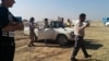 Homeowners from villages where Islamic State fighters have been driven out in recent days return to visit and gather any of their possessions that remain, despite the danger of hidden bombs in the villages, in Iraq's Kazir province, Oct. 22, 2016. (H. Mur