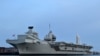 英国皇家海军“伊丽莎白女王”号（HMS Queen Elizabeth）航母停泊在英国南部一个港口。 （法新社2019年6月5日）