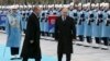 FILE - Russian President Vladimir Putin (R) and his Turkish counterpart Recep Tayyip Erdogan inspect military honour guard during a welcome ceremony in Ankara, Turkey, Dec. 1, 2014.