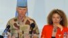 Norwegian Major General Robert Mood (L), chief of the United Nations Supervision Mission in Syria, addresses a news conference in Damascus next to spokeswoman Sawsan Ghoshe, July 5, 2012. 