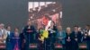 Pro-Kurdish politicians Sirri Sureyya Onder (3rd L) and Pervin Buldan (6th R) read the statement of jailed Kurdish rebel leader Abdullah Ocalan in the southeastern Turkish city of Diyarbakir March 21, 2013.
