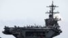 The USS Theodore Roosevelt is seen while entering into the port in Da Nang, Vietnam, March 5, 2020. 
