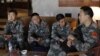 U.N. observers from China at at hotel in Damascus before heading to areas where protests against Syrian President Bashar al-Assad have been taking place, May 18, 2012.