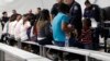 US Starts Sending Asylum-Seekers Across Arizona Border