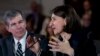 FILE - Australian NSW Premier Gladys Berejiklian speaks accompanied during the National Governor Association 2018 winter meeting, on Feb. 24, 2018, in Washington. Gov. Roy Cooper of North Carolina looks on.