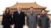 President Donald Trump, second left, first lady Melania Trump, left, Chinese President Xi Jinping, second right, and his wife Peng Liyuan, right, stand together as they tour the Forbidden City, Nov. 8, 2017, in Beijing, China. 