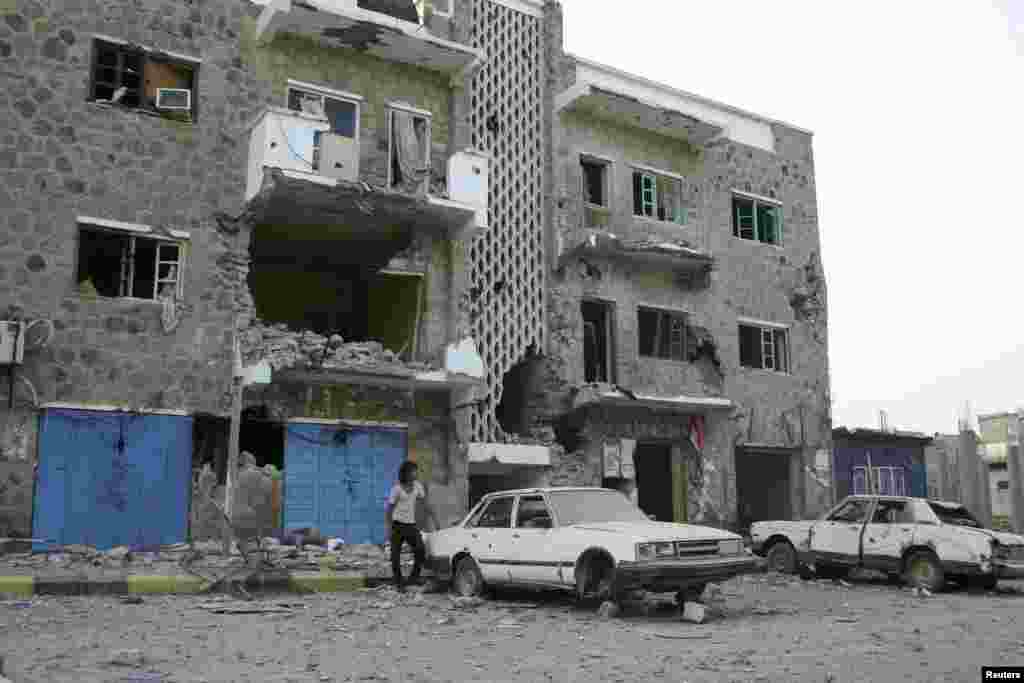 A building damaged during fighting between army forces and al-Qaida-linked militants in the southern Yemeni city of Zinjibar, June 12, 2012.
