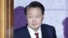 (FILES) South Korea's impeached President Yoon Suk Yeol arrives to attend the fourth hearing of his impeachment trial over his short-lived imposition of martial law at the Constitutional Court in Seoul on January 23, 2025.