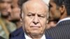 Yemeni President Abed Rabbo Mansour Hadi looks on during a funeral service for Major General Salem Ali Qatan, the commander of military forces in the south of Yemen, Sanaa, June 19, 2012.