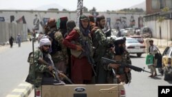 Taliban fighters patrol in Kabul, Afghanistan, Aug. 19, 2021.