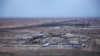 FILE - Al-Asad air base is seen in the western Anbar desert, Iraq, Dec. 29, 2019. 