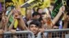 FILE - Supporters of the pro-Kurdish Peoples' Democracy Party (HDP) are seen at an election rally in Istanbul, Aug. 3, 2014.