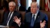 Secretary of State Rex Tillerson listens as President Donald Trump speaks during a cabinet meeting at the White House, Nov. 1, 2017.