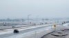 Motorists make their way along Interstate 380 in North Liberty, Iowa, Dec. 14, 2024. (Nick Rohlman/The Gazette via AP)