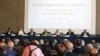 Arab League head Nabil El-Arabi (C) speaks at the Syrian Opposition Conference in Cairo, Egypt, July 2, 2012. 